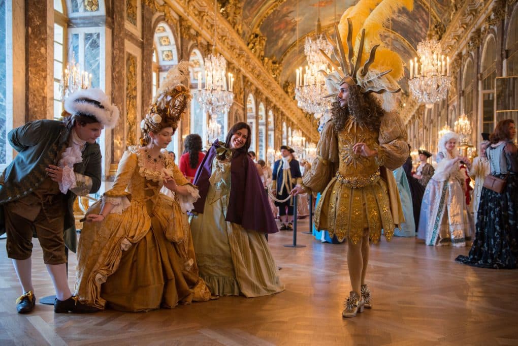 Period costume ball brings France's Sun King back to life in Versailles